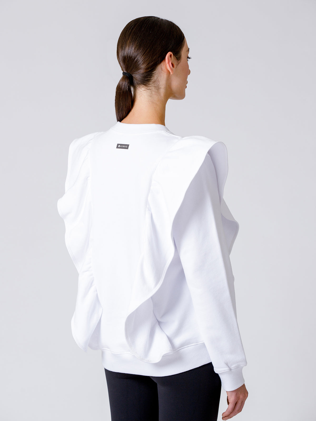 EMPOWER RUFFLED SWEATSHIRT