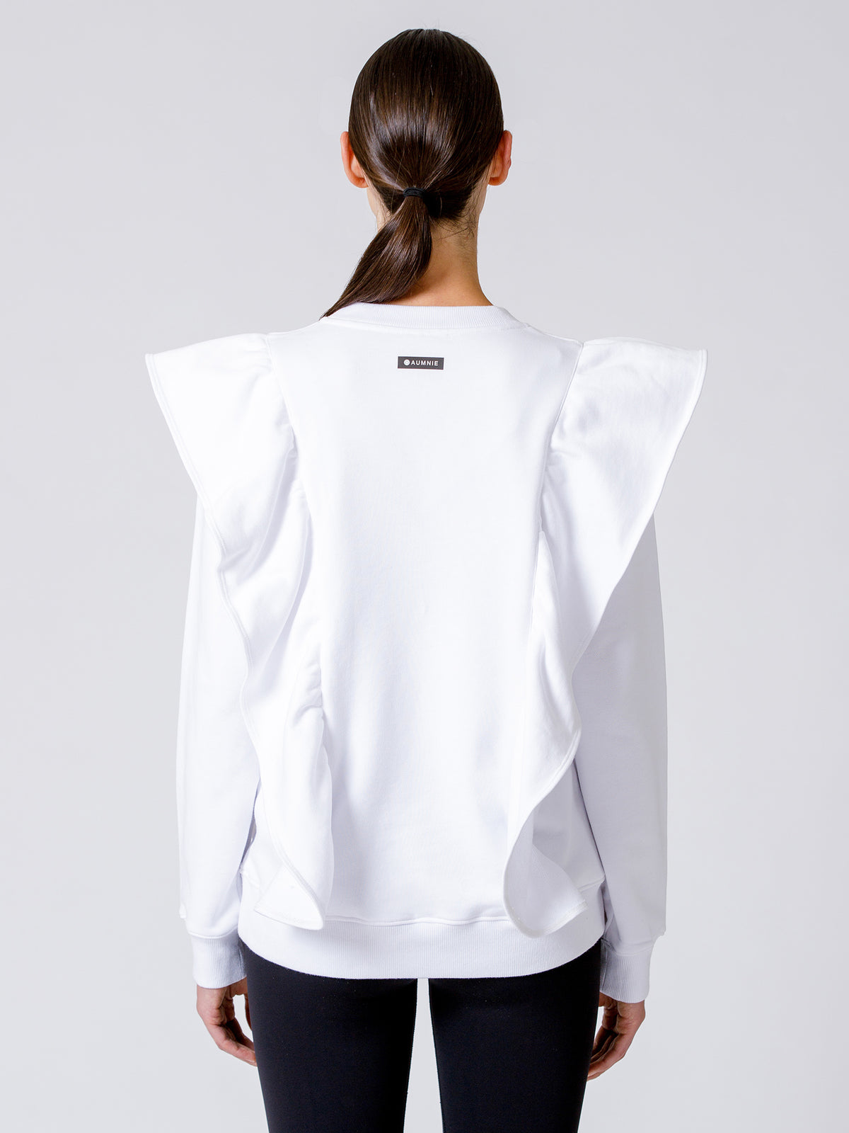 EMPOWER RUFFLED SWEATSHIRT